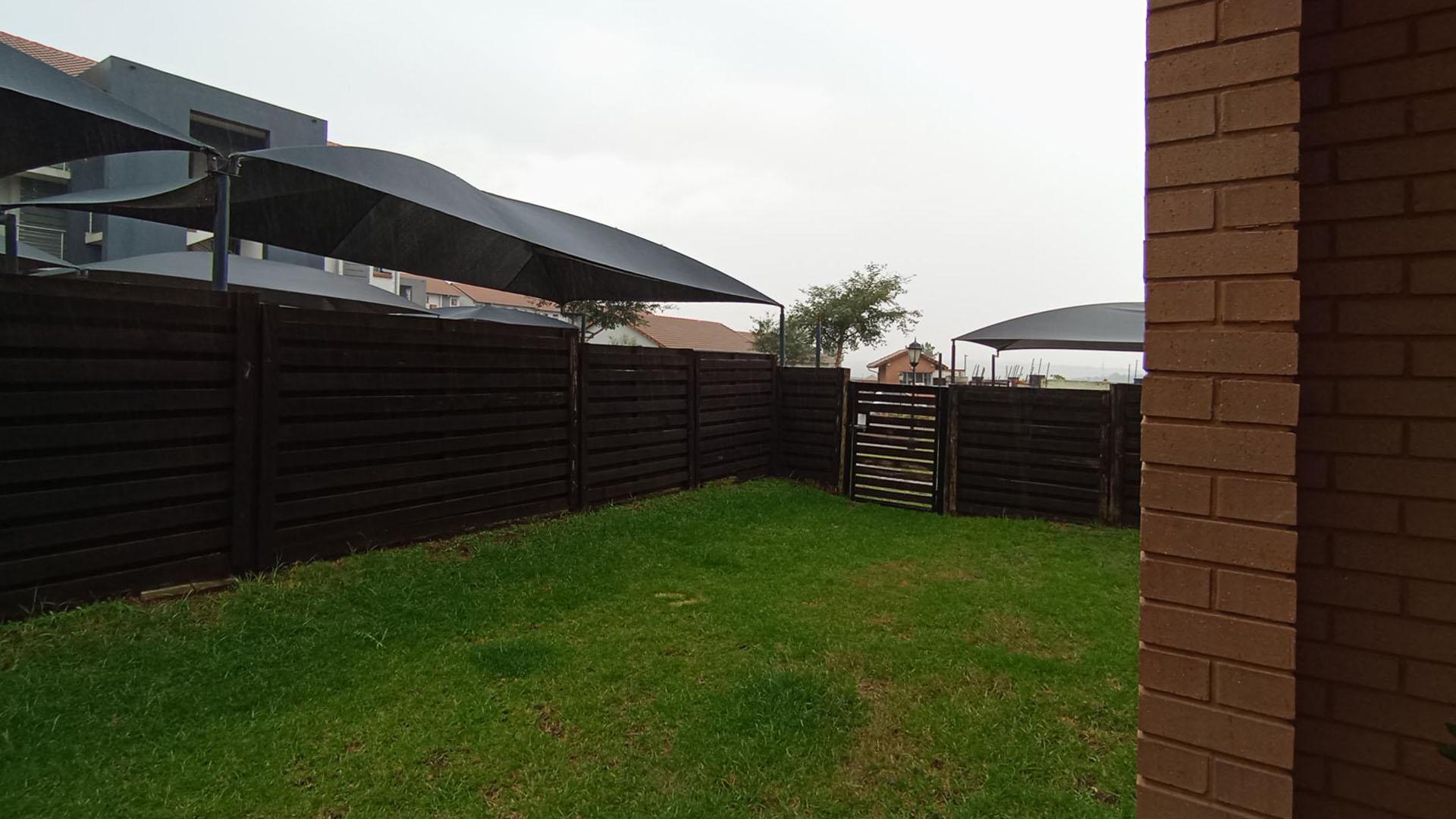 Backyard of property in Sagewood