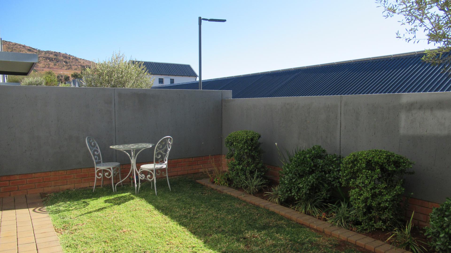 Backyard of property in Homes Haven