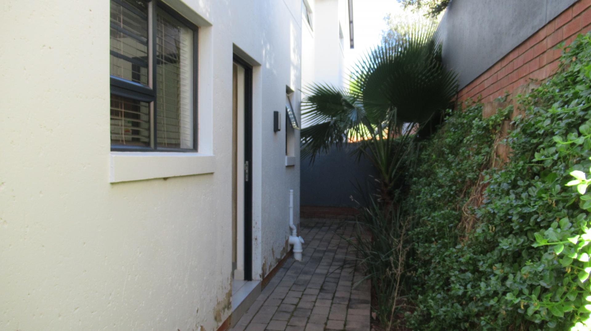 Backyard of property in Homes Haven