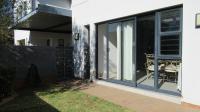Backyard of property in Homes Haven