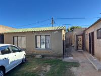 Front View of property in Slovoville