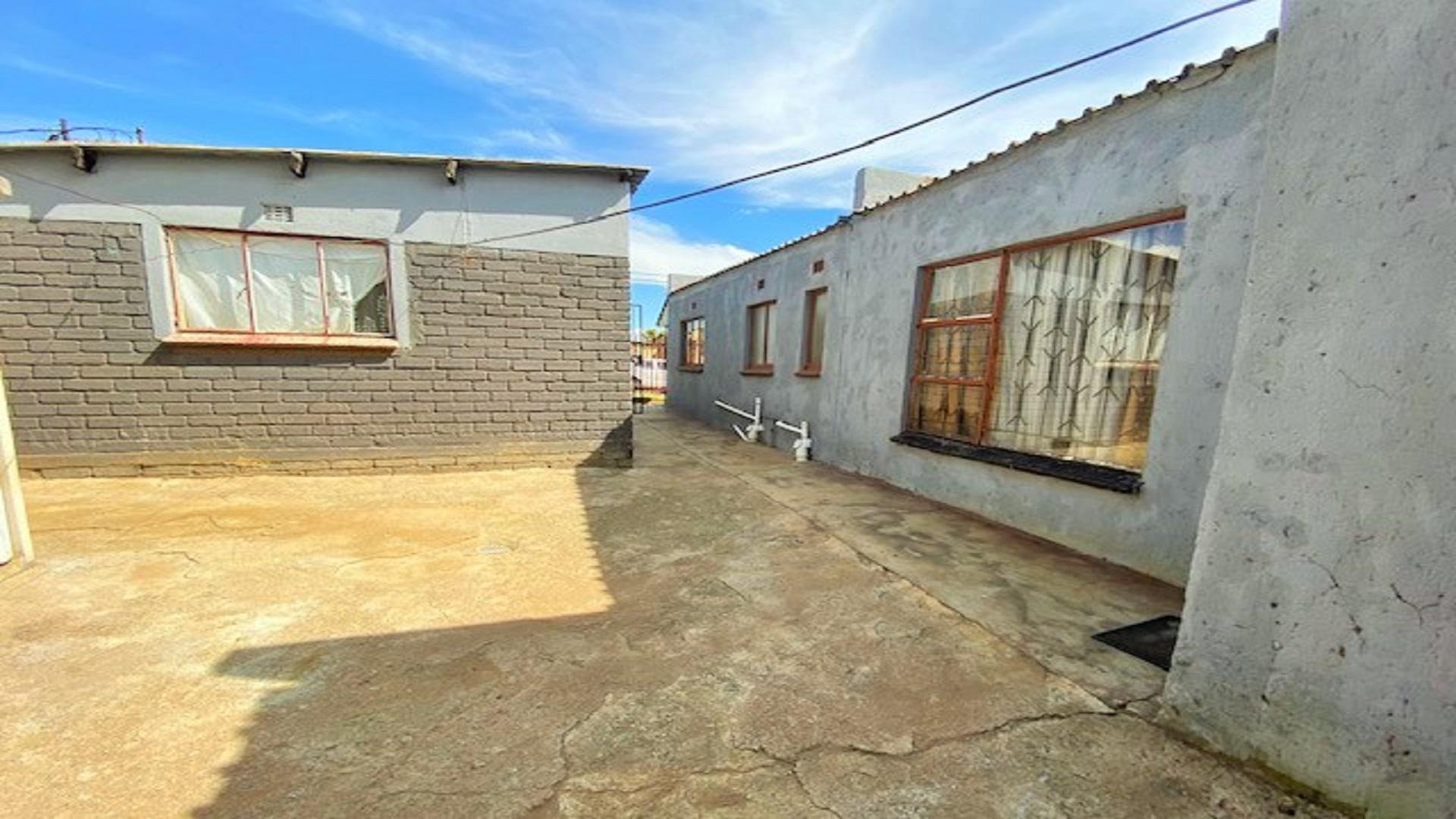 Backyard of property in Langaville