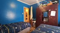 Bed Room 1 - 11 square meters of property in Parow Central