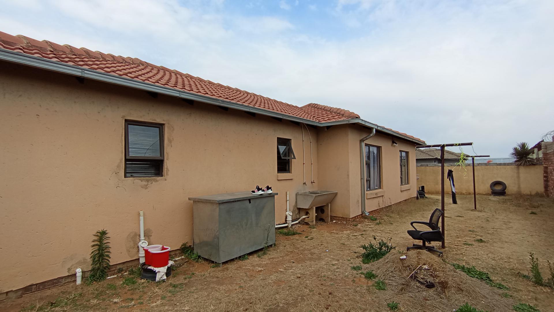 Backyard of property in Azaadville Gardens