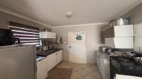 Kitchen of property in Azaadville Gardens