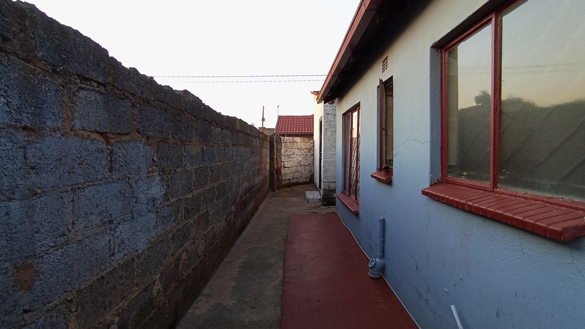 Backyard of property in Clayville