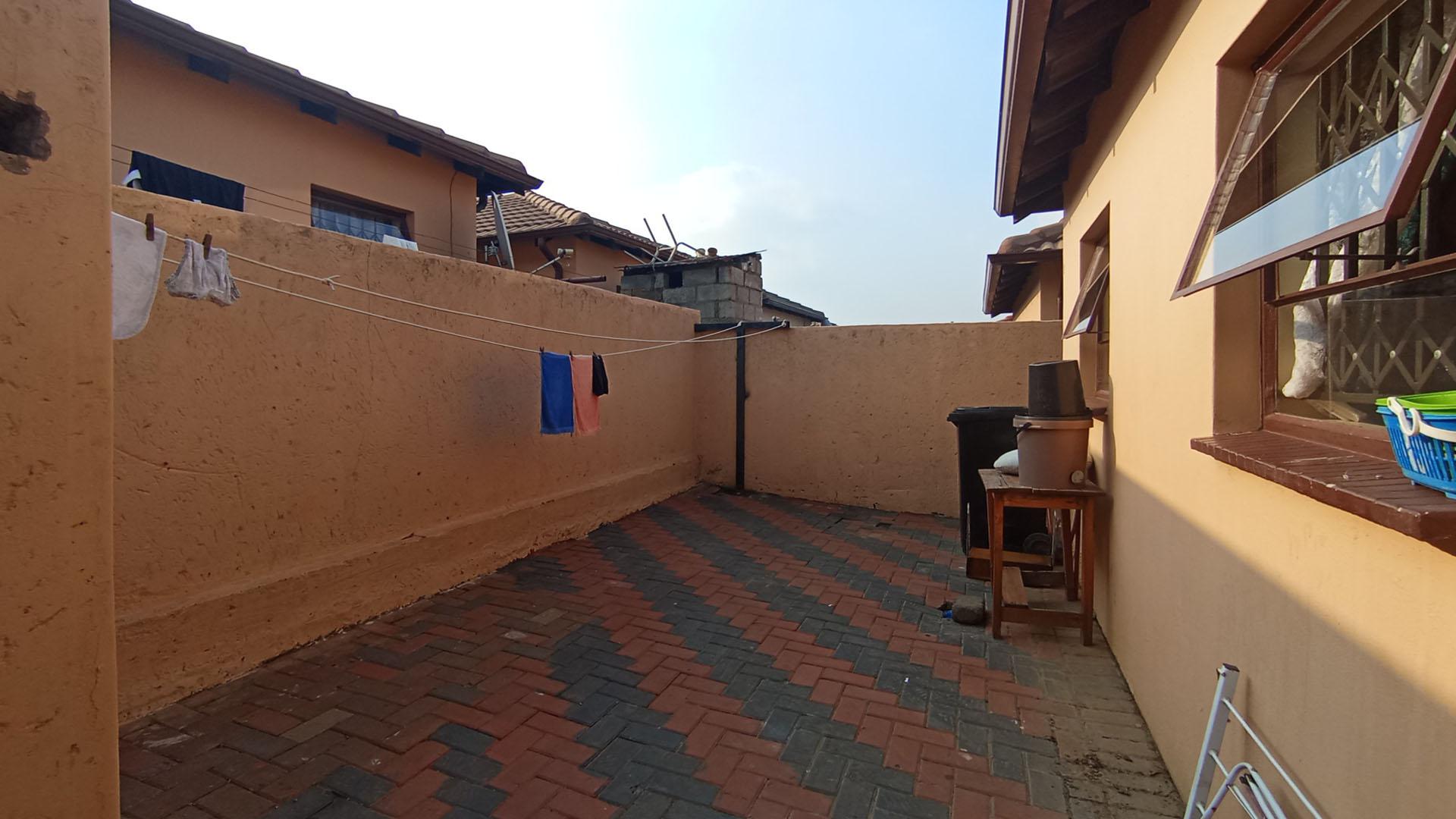 Backyard of property in Clayville