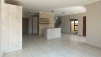 Lounges - 15 square meters of property in Rooihuiskraal North