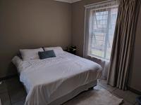 Main Bedroom of property in Rooihuiskraal North