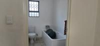 Main Bathroom of property in Benoni AH