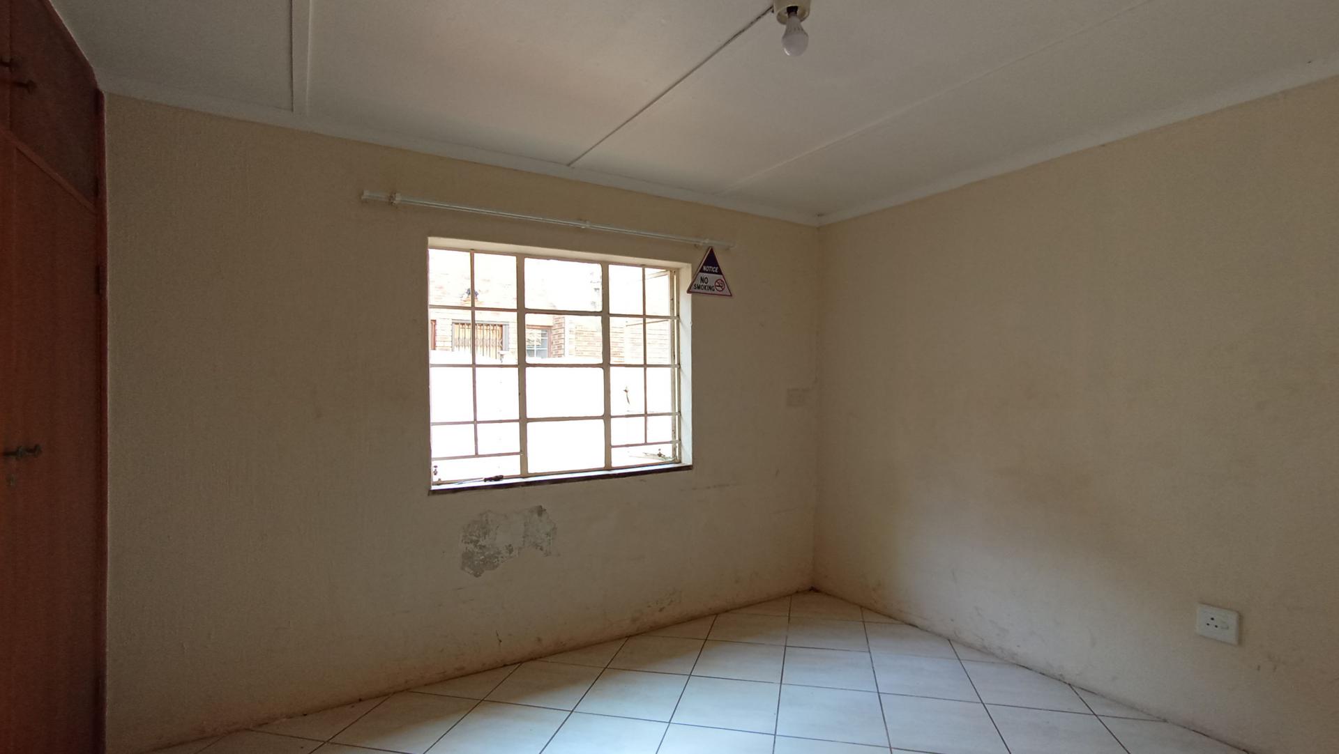 Bed Room 1 - 28 square meters of property in Westdene (JHB)