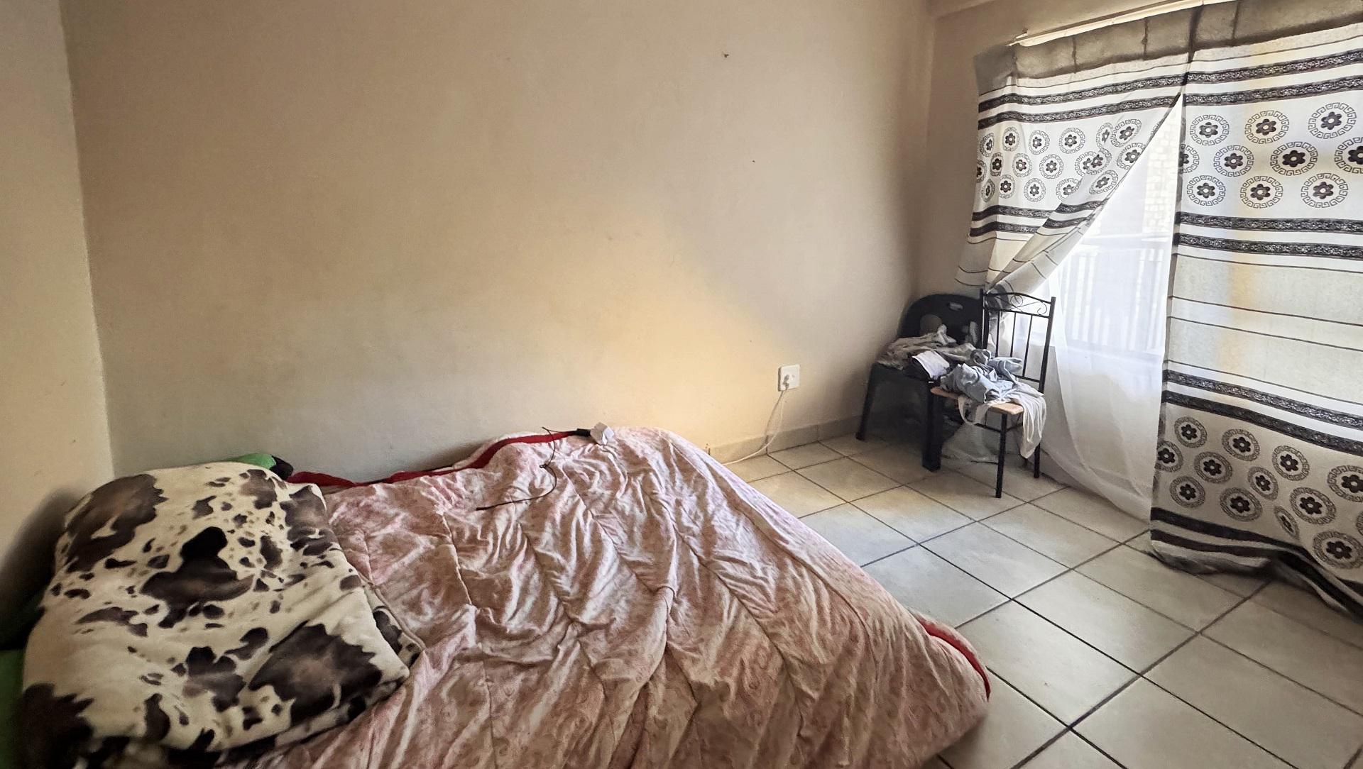 Bed Room 1 of property in Potchefstroom