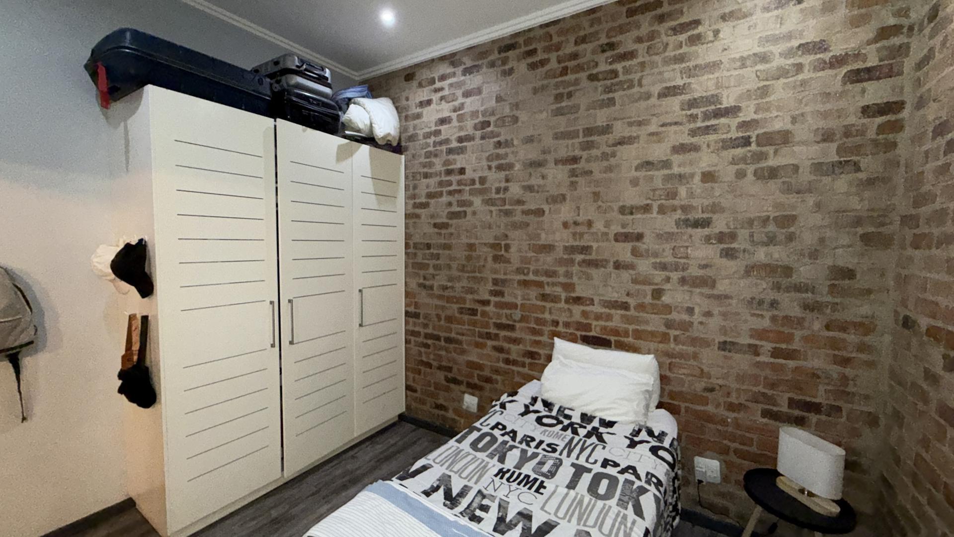 Bed Room 1 of property in Braamfontein