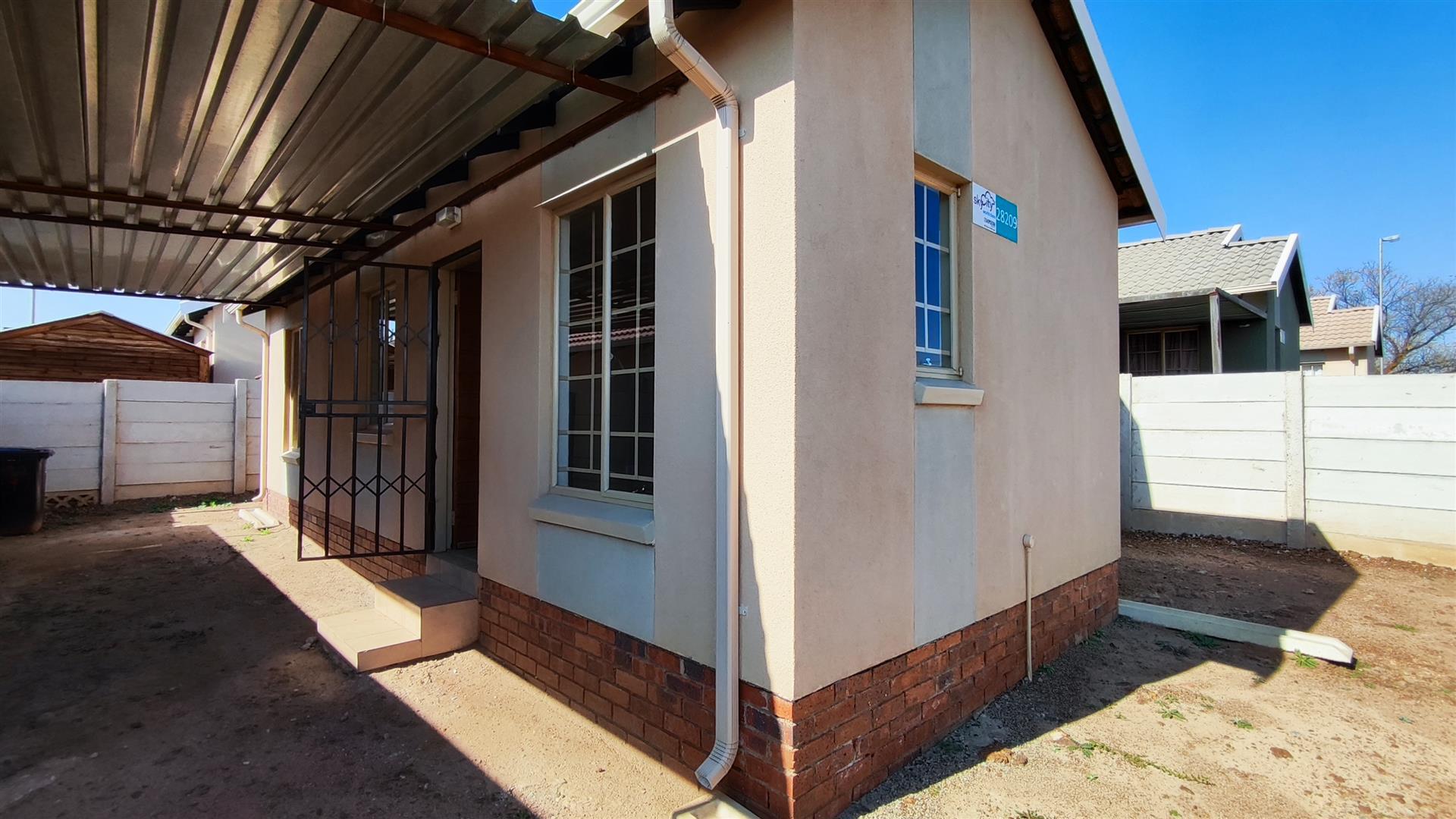 Front View of property in Palm Ridge