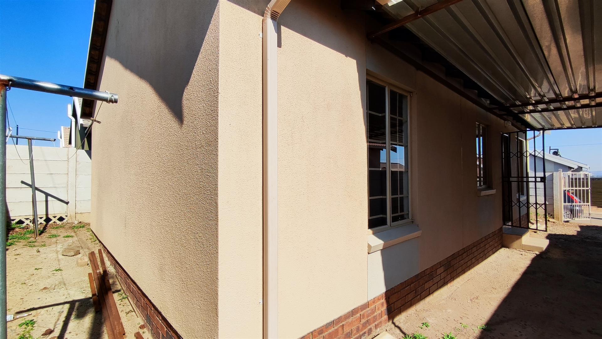 Backyard of property in Palm Ridge