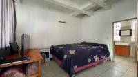 Bed Room 1 of property in Braamfontein