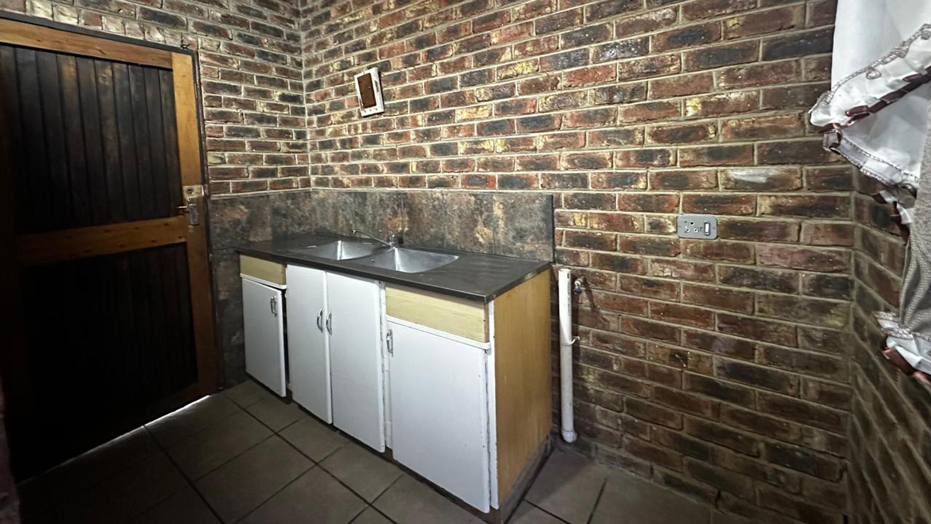 Scullery of property in DEALESVILLE