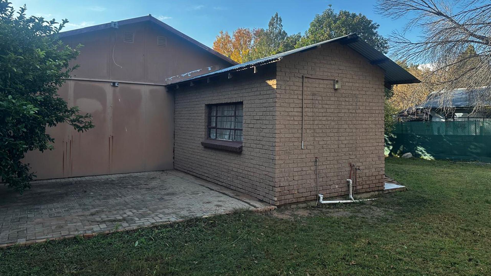 Backyard of property in DEALESVILLE