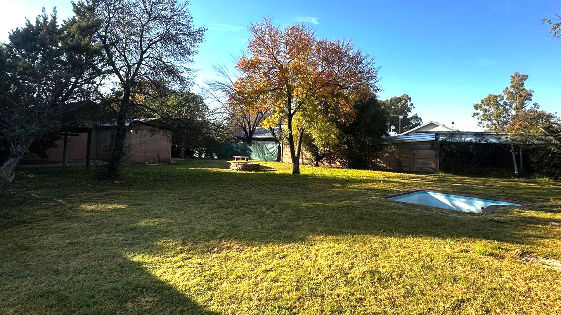 Backyard of property in DEALESVILLE