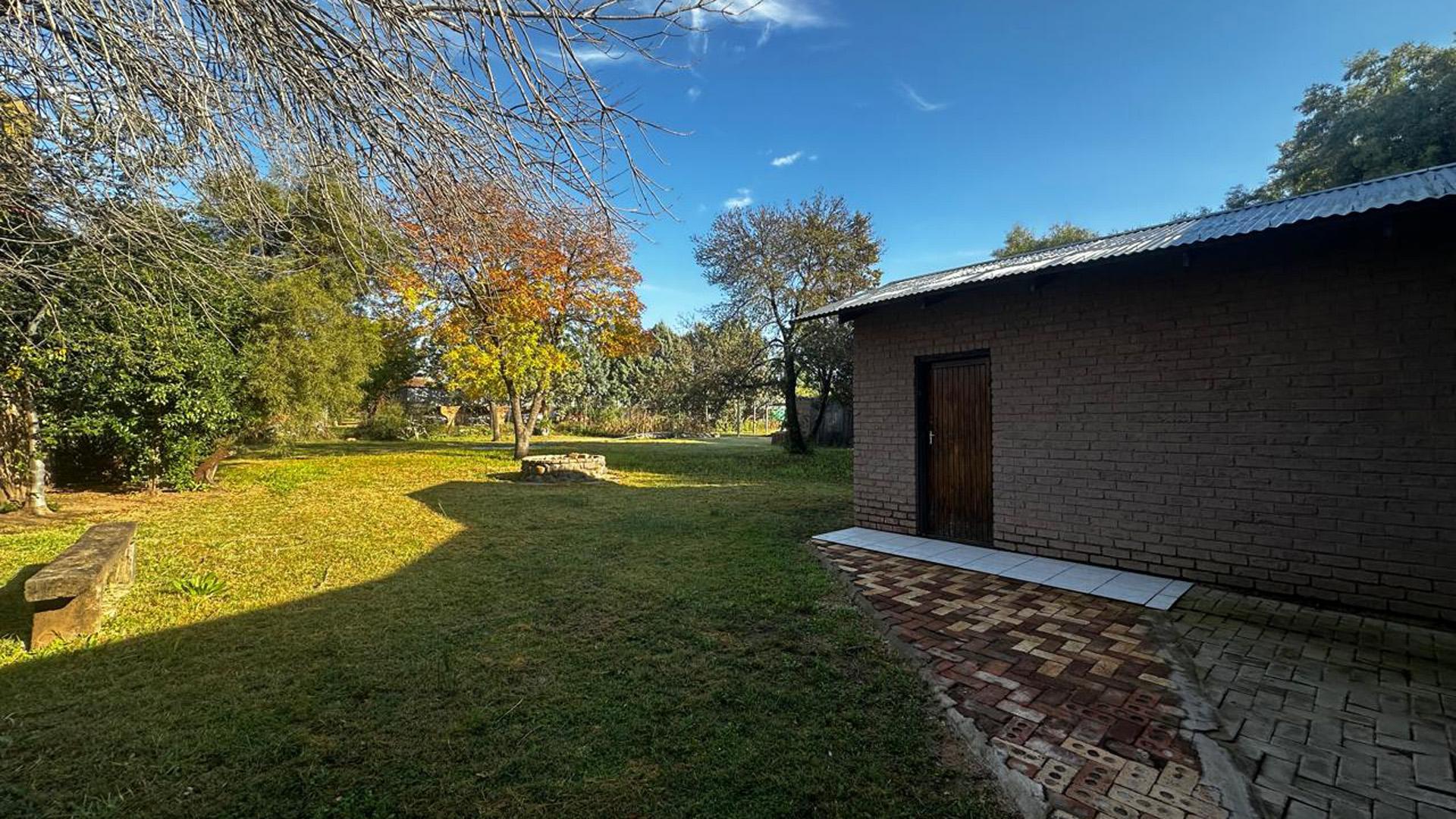 Backyard of property in DEALESVILLE