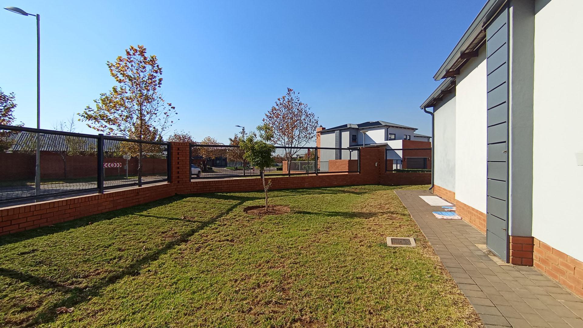 Backyard of property in Six Fountains Estate