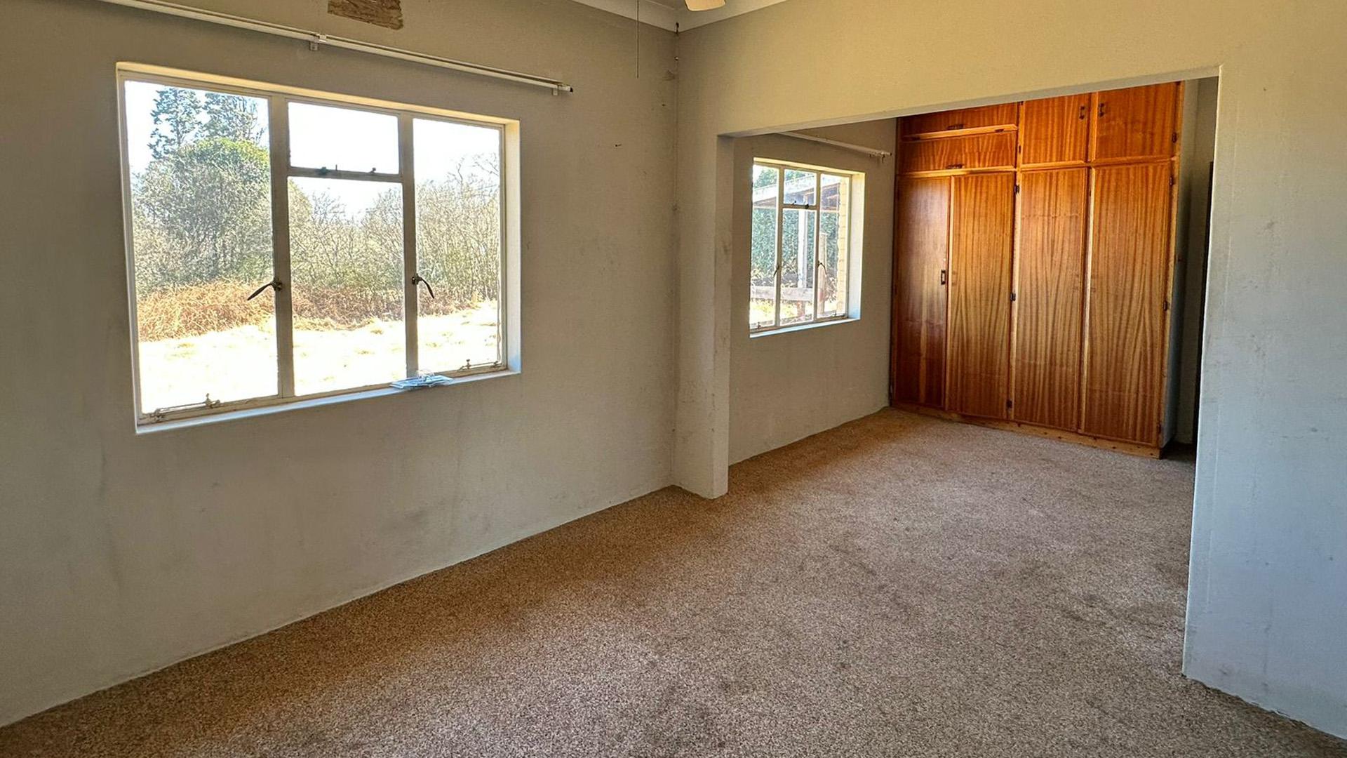 Bed Room 1 of property in Wakkerstroom