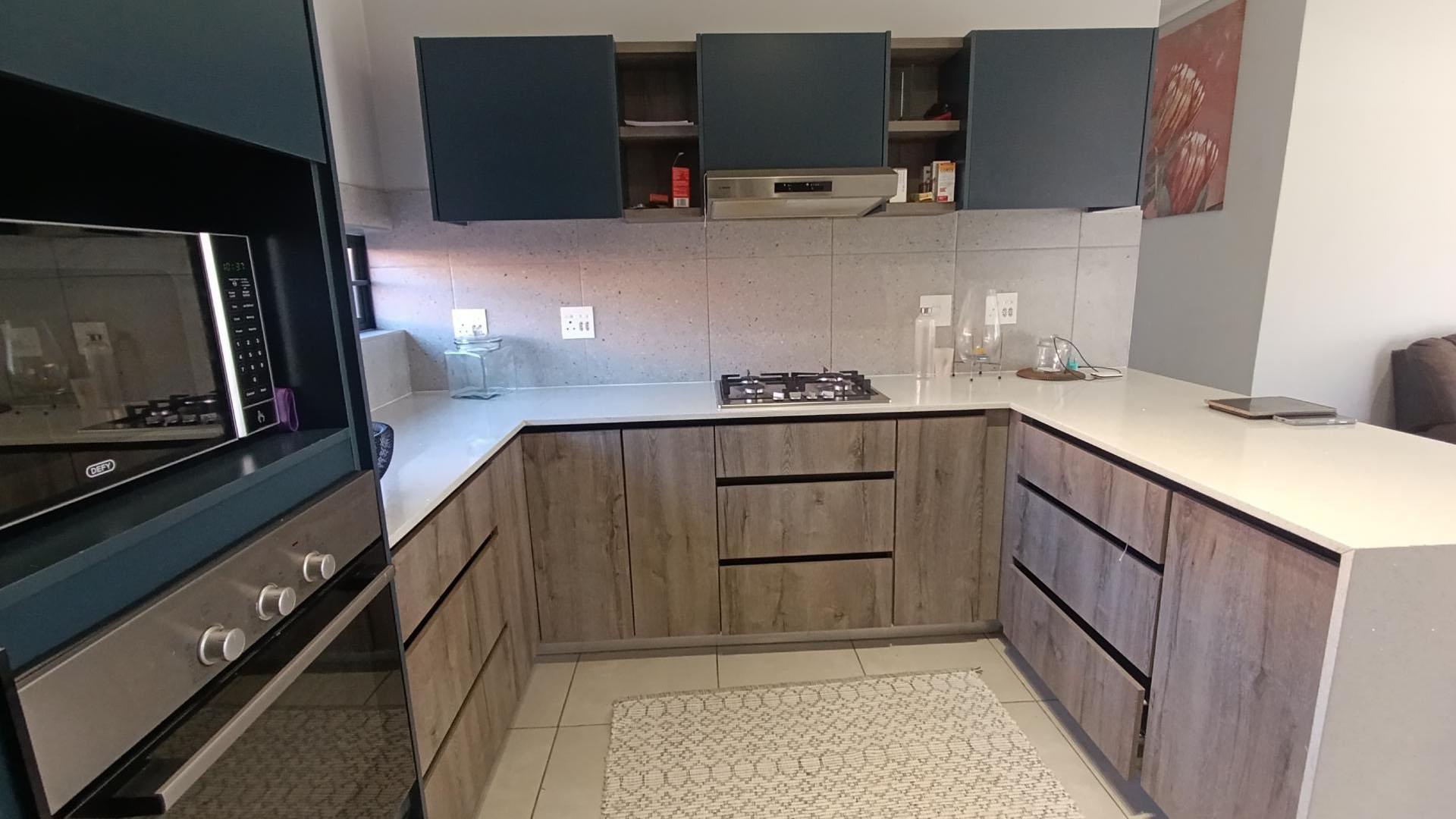 Kitchen of property in Rooihuiskraal North