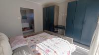 Bed Room 1 of property in Rooihuiskraal North