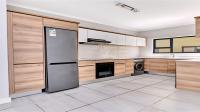 Kitchen of property in Waterfall Country Village