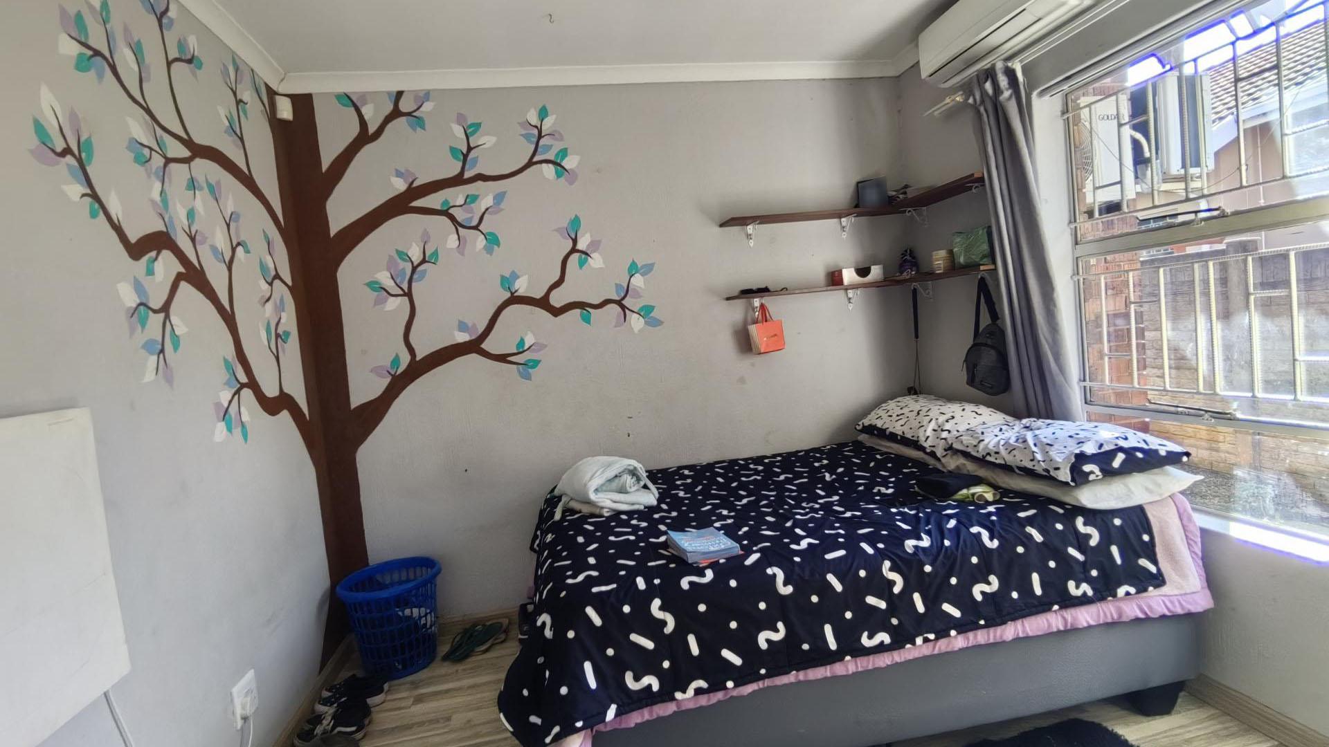 Bed Room 1 of property in Rustenburg