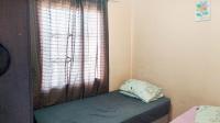 Bed Room 1 of property in Rustenburg