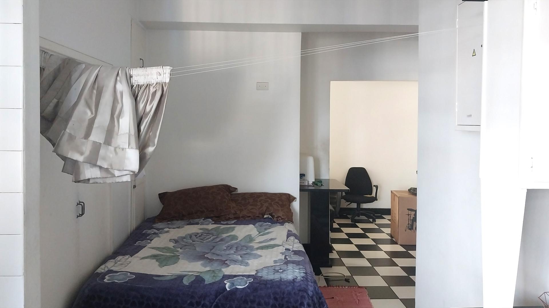 Bed Room 1 of property in Johannesburg Central