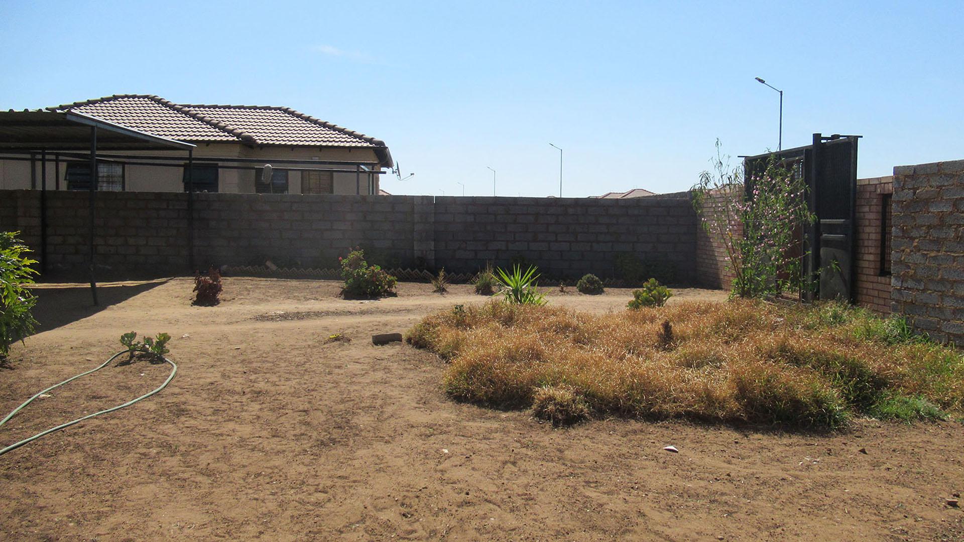 Backyard of property in Azaadville Gardens