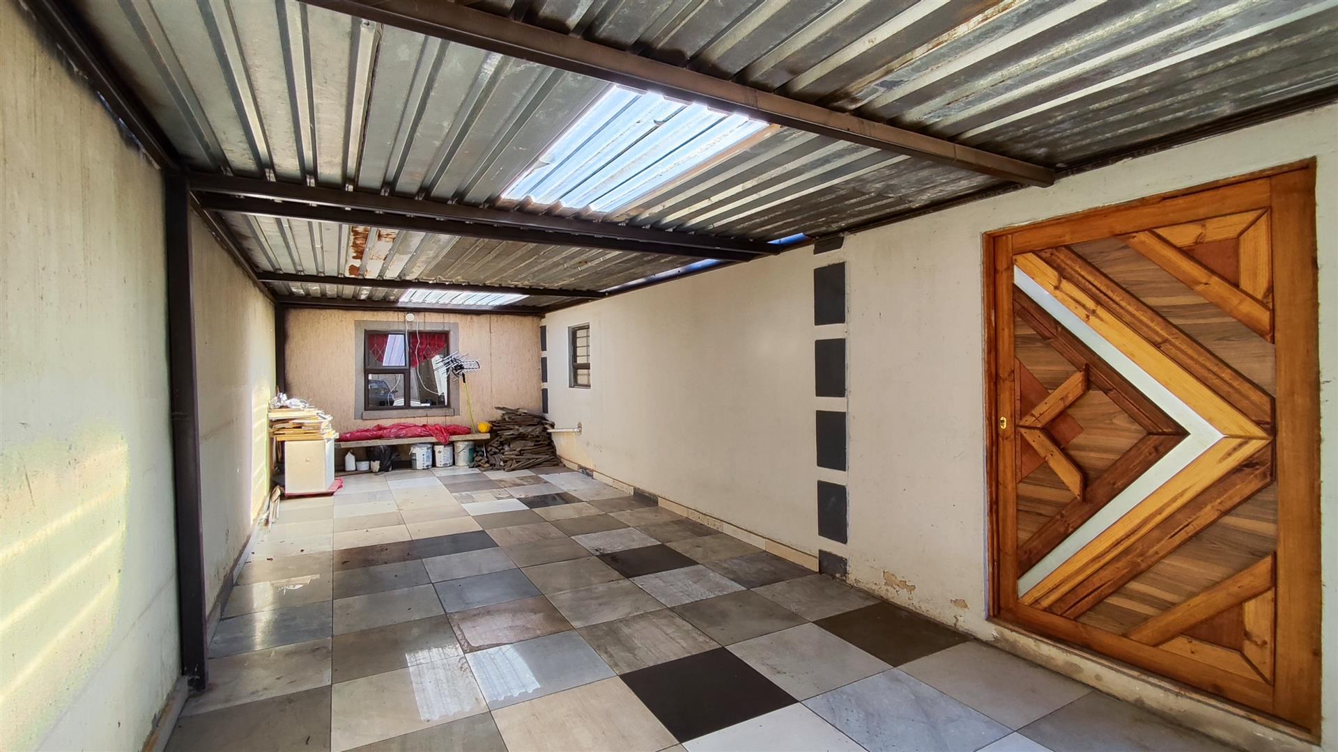 Garage of property in Alliance