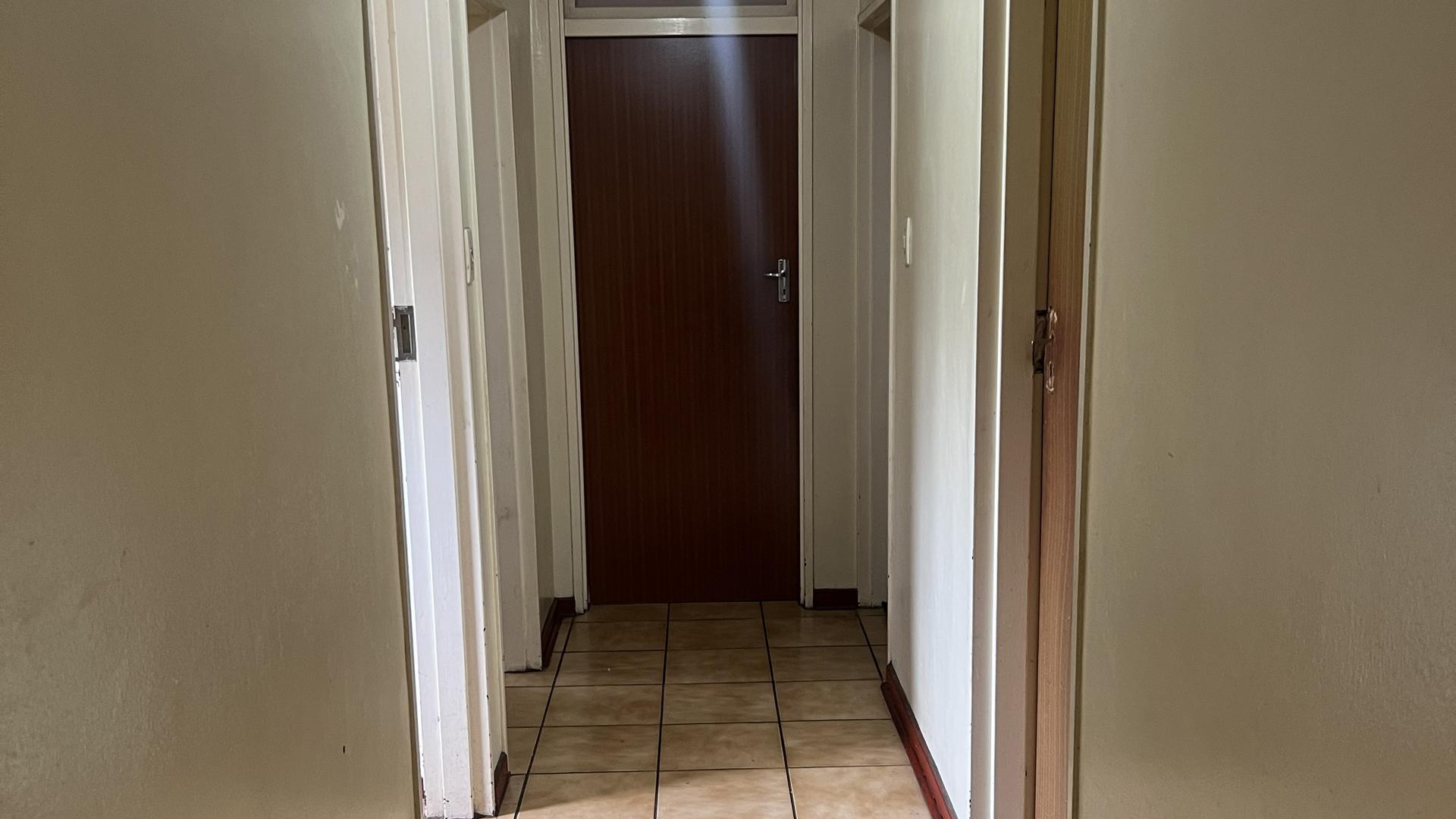 Spaces of property in Komati