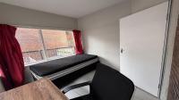 Bed Room 1 of property in Braamfontein