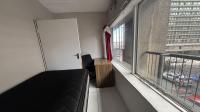 Bed Room 1 of property in Braamfontein