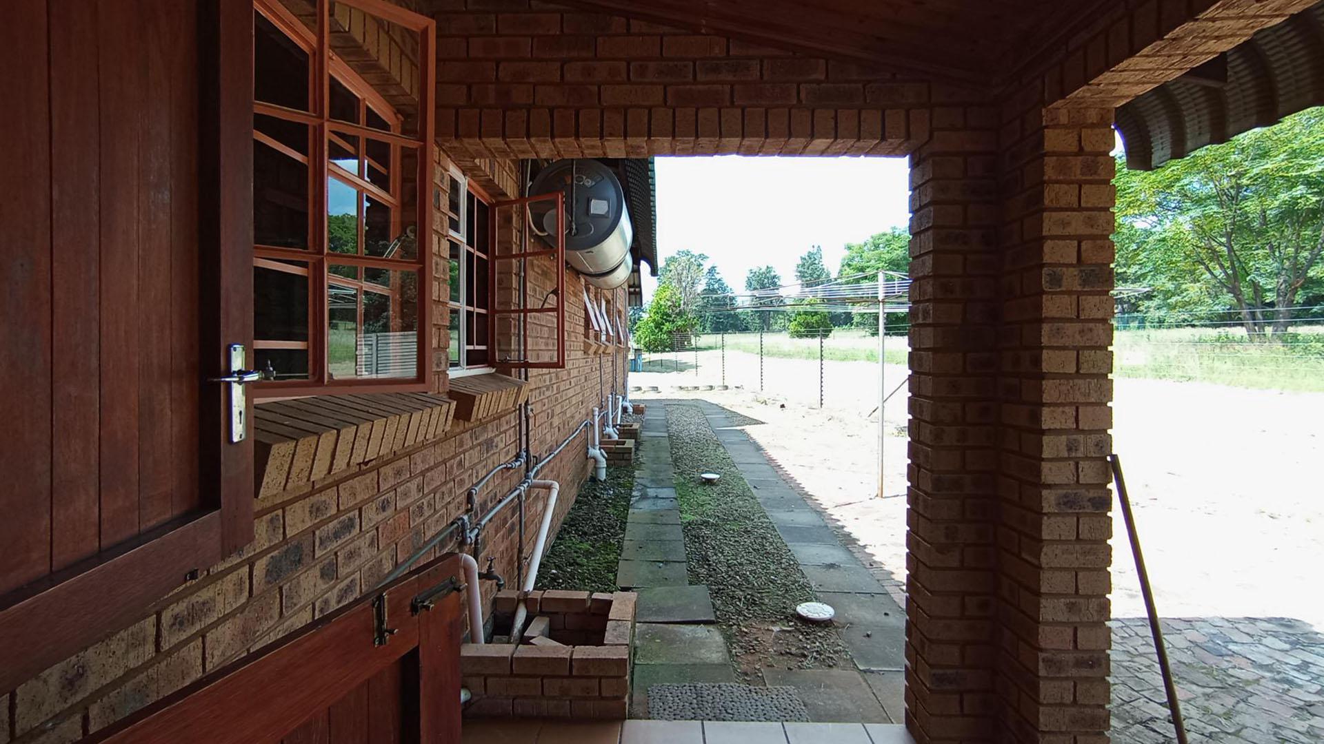 Backyard of property in Sunset View AH