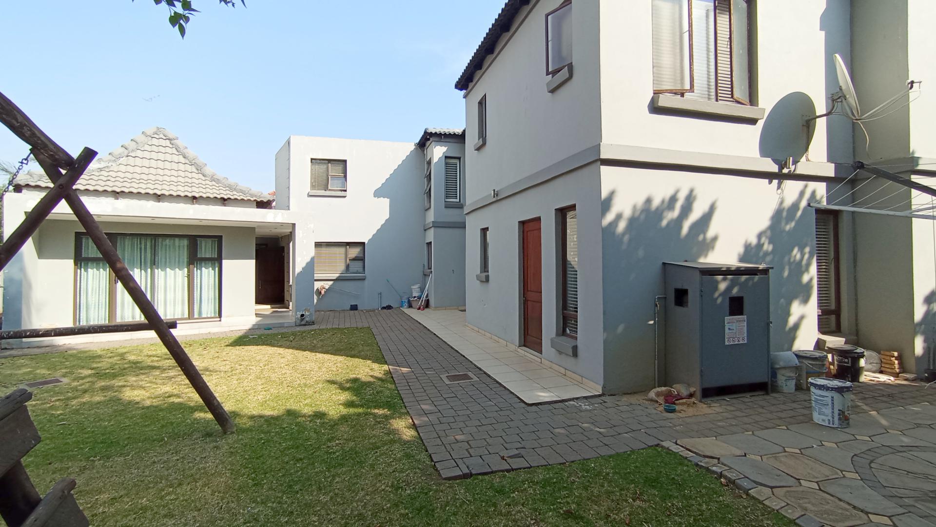 Backyard of property in Midstream Estate