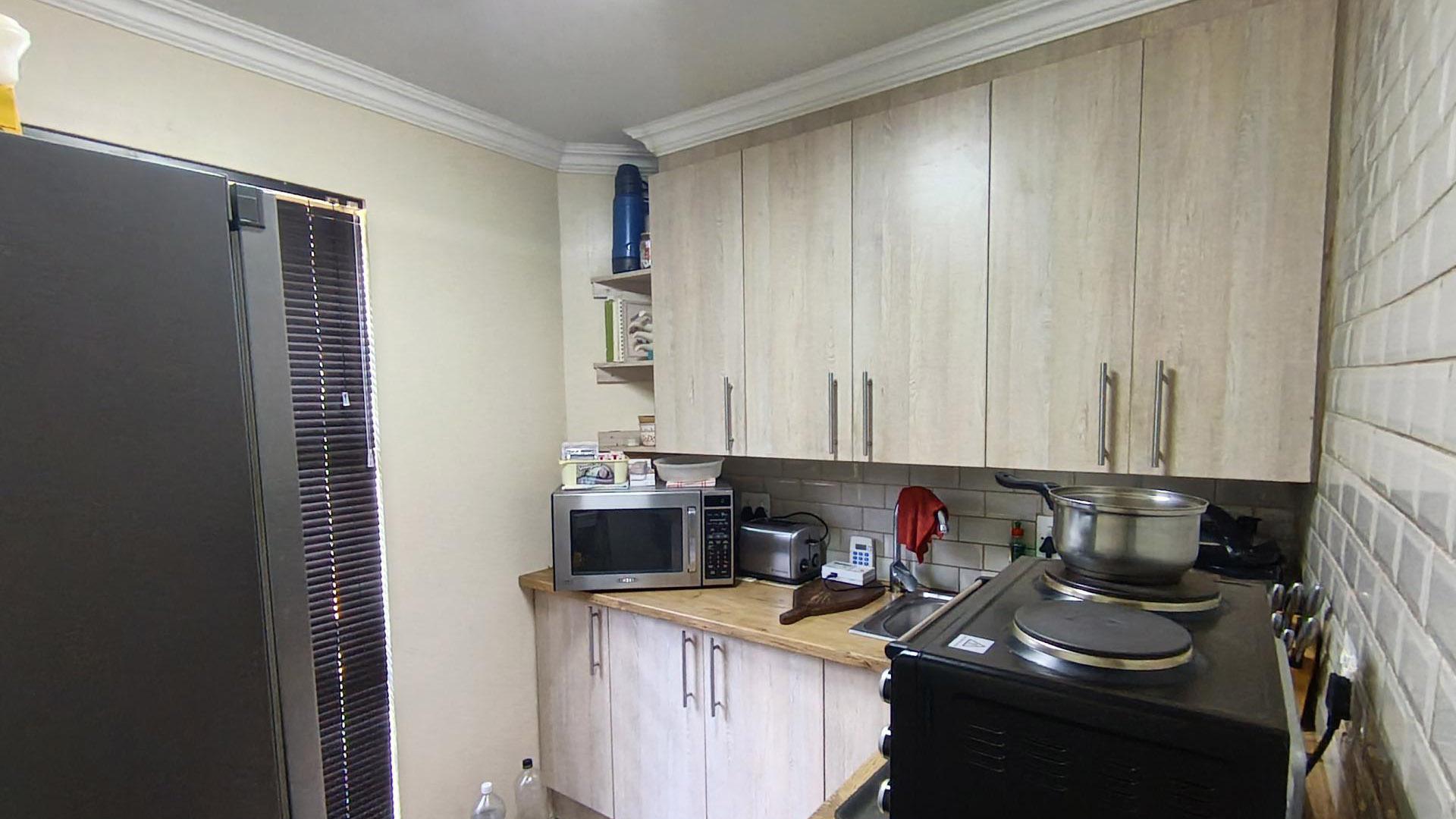 Kitchen of property in Langenhoven Park