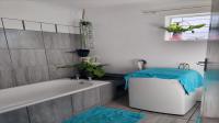 Main Bathroom of property in Woodlands - CPT