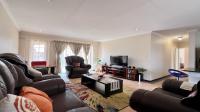 Lounges of property in Mooikloof Ridge