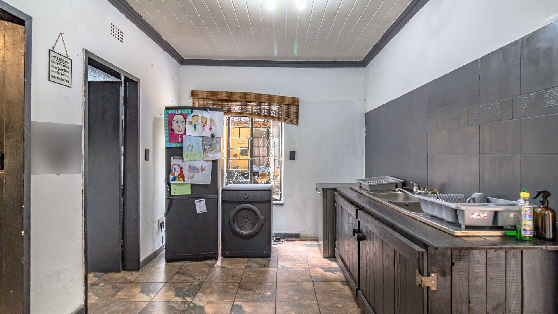 Laundry Room  of property in Westdene (JHB)