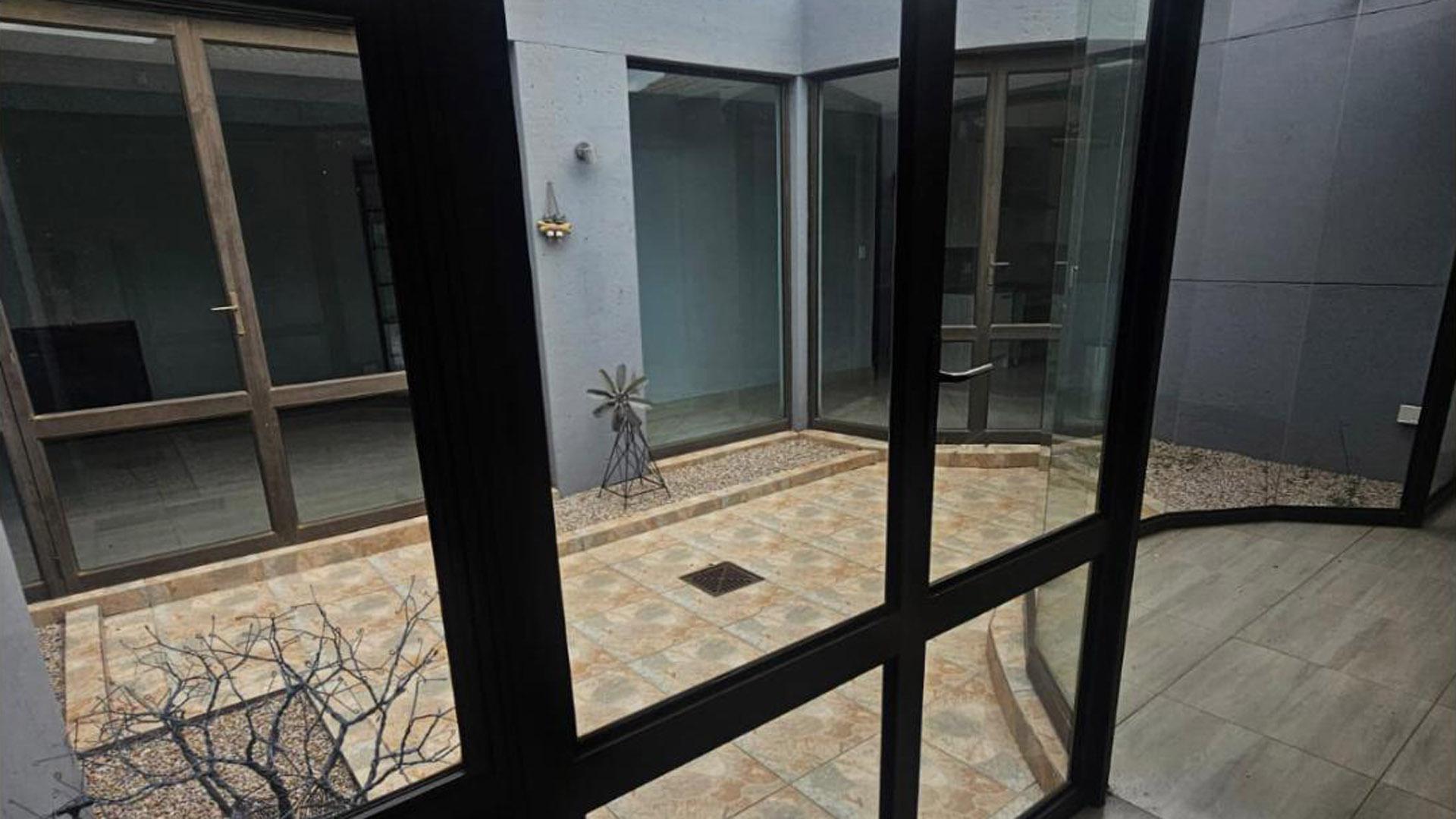 Patio of property in Mooikloof Ridge