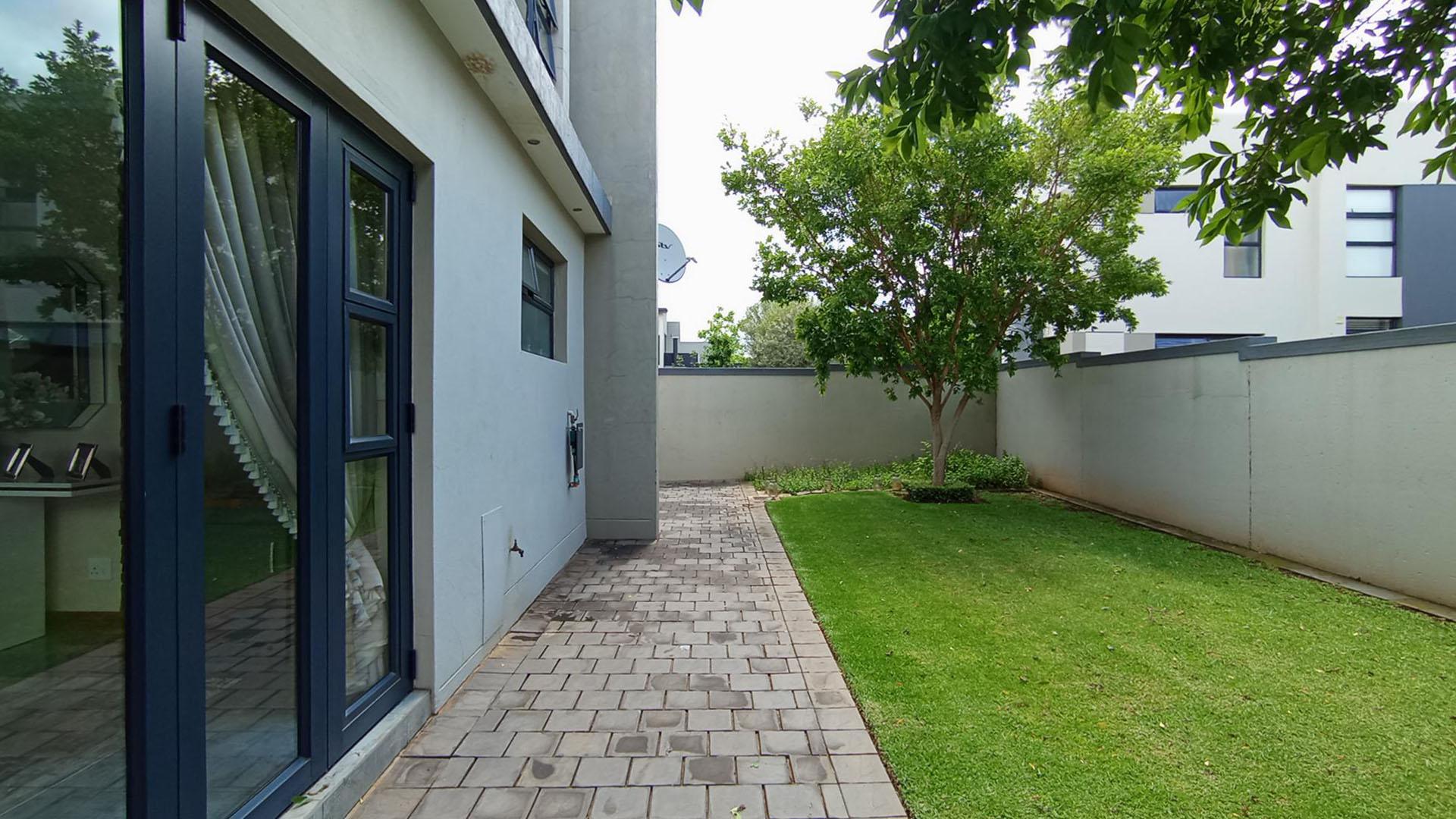 Backyard of property in Midstream Estate