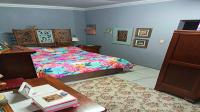 Main Bedroom of property in Wierdapark