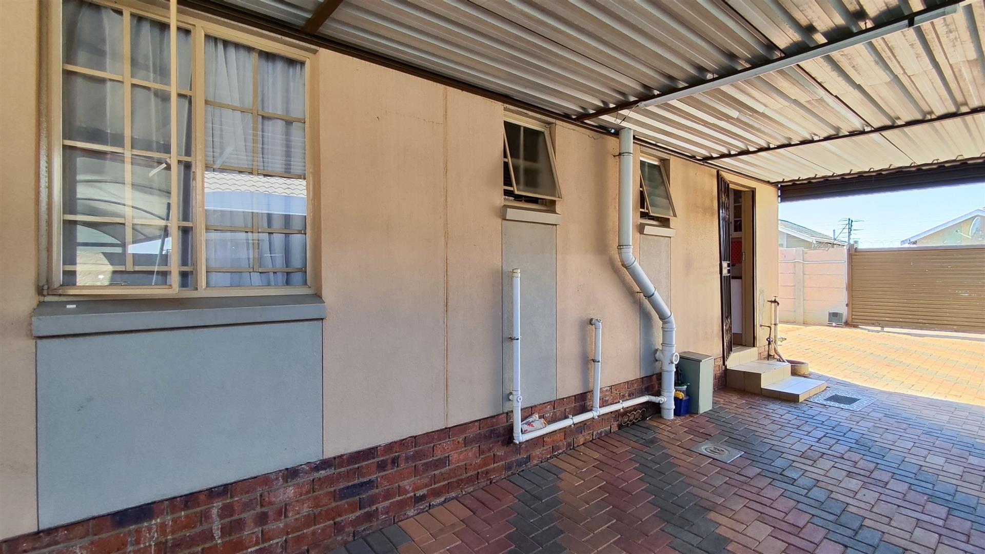 Backyard of property in Palm Ridge