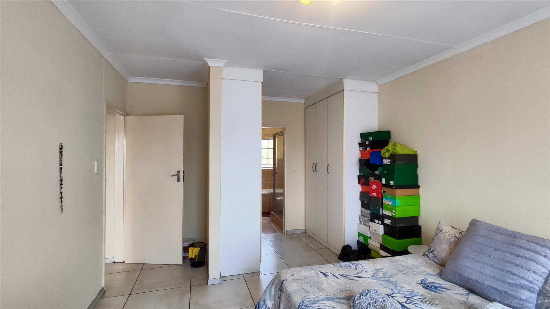 Main Bedroom - 13 square meters of property in Rand Collieries Sh