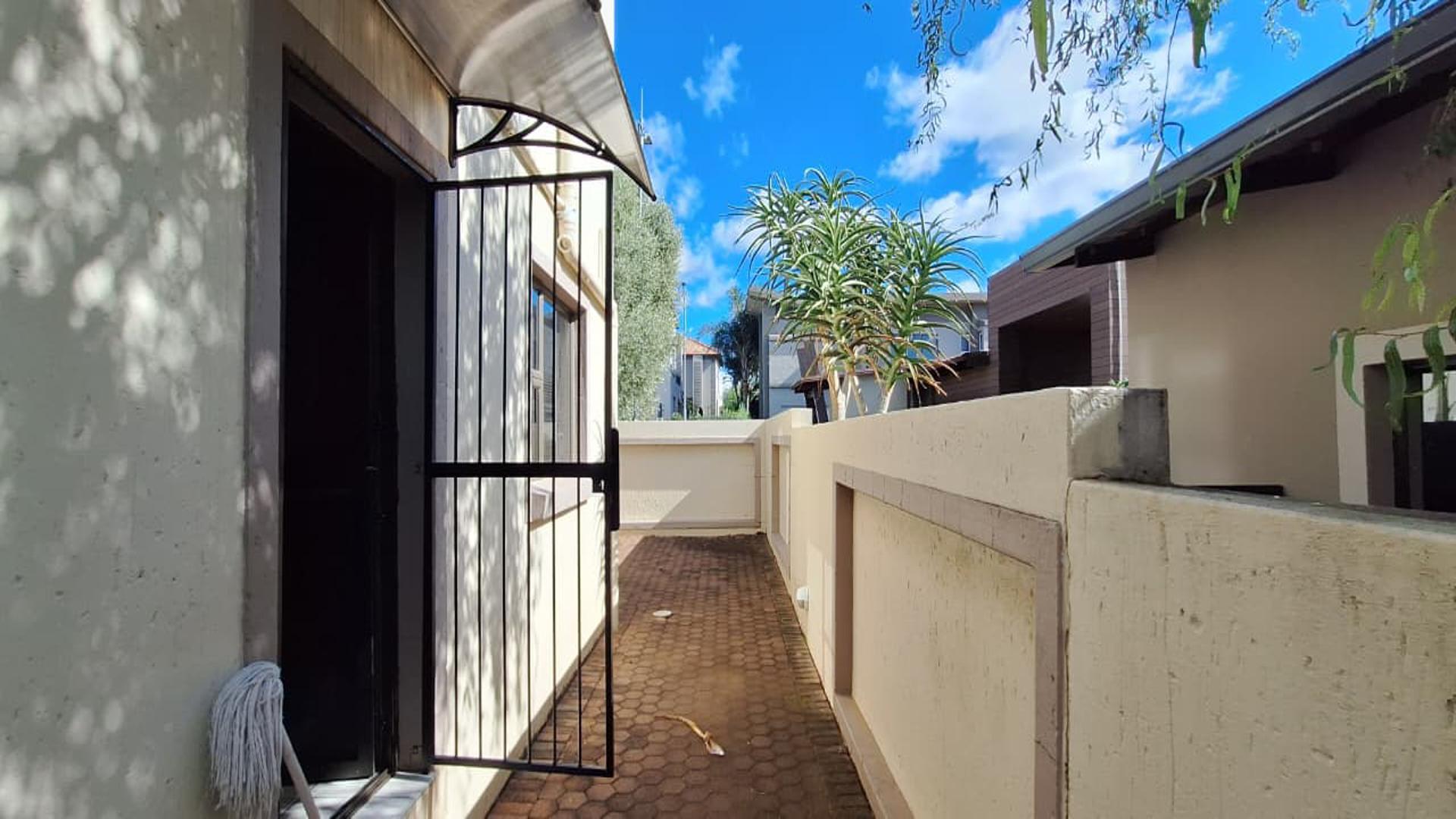 Backyard of property in Homes Haven