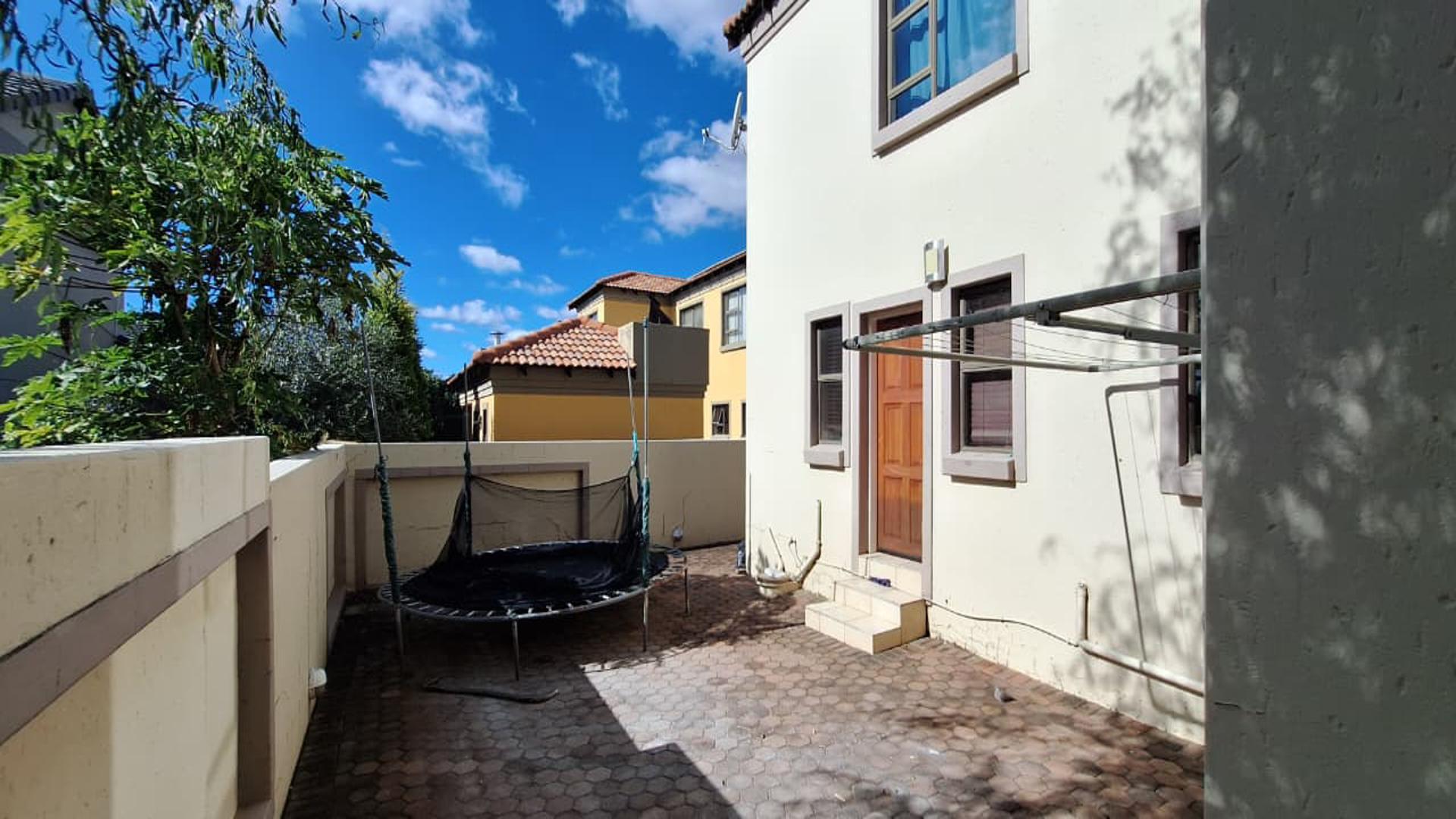 Backyard of property in Homes Haven